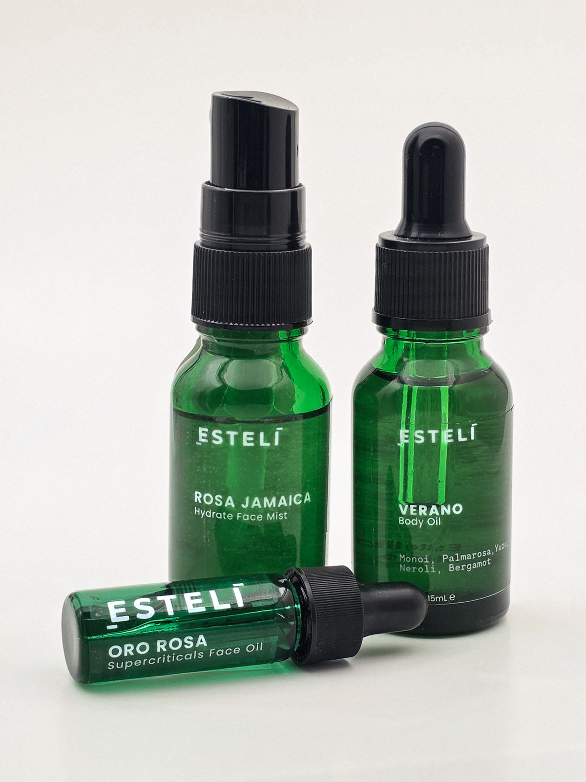 ESTELÍ Discovery Ritual with Rosa Jamaica face mist, Oro Rosa face oil, and Verano body oil