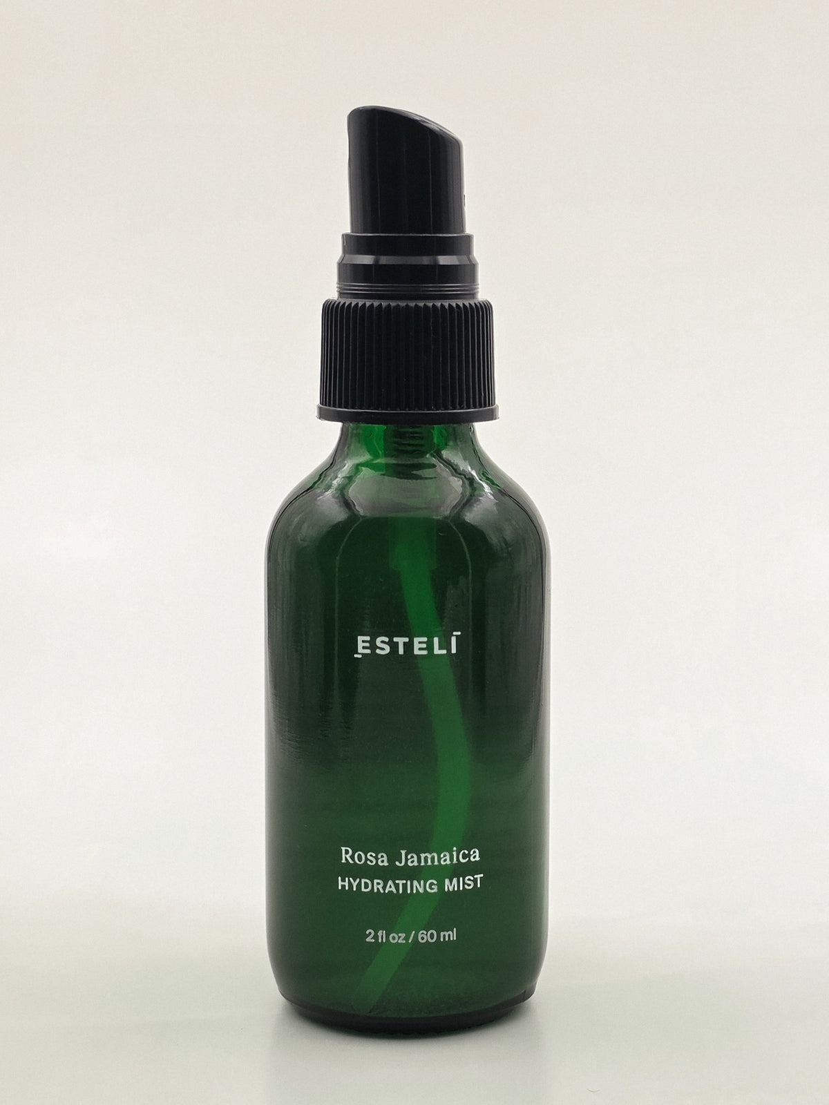 ESTELÍ Rosa Jamaica Hydrating Mist, 60 ml green glass spray bottle