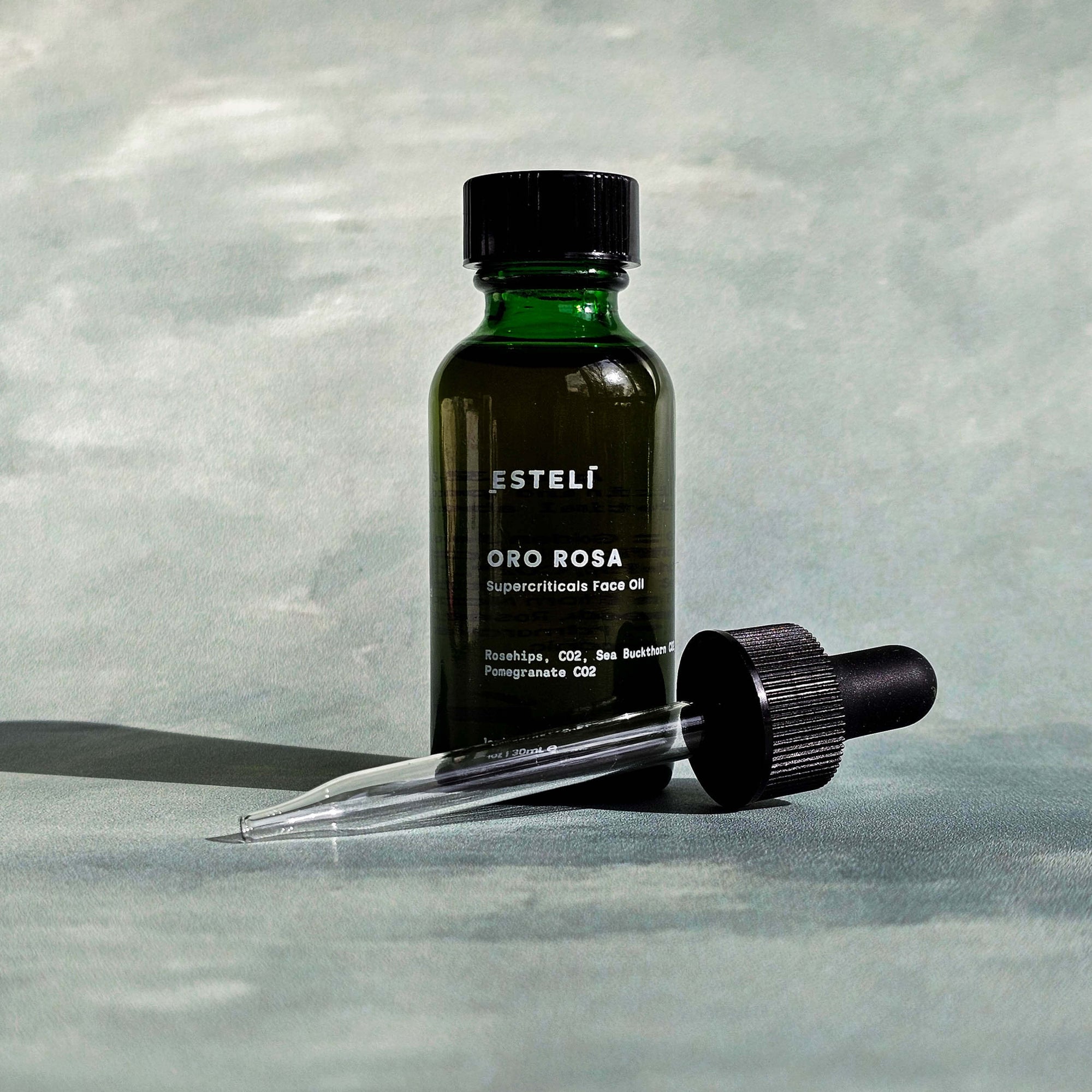 Oro Rosa botanical face oil with rosehip, sea buckthorn, and pomegranate CO₂ extracts
